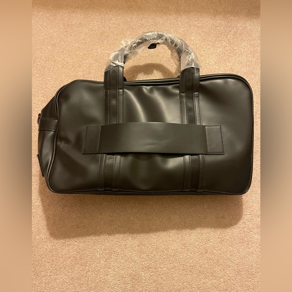 2/$50 final sale Sleek Black travel Bag